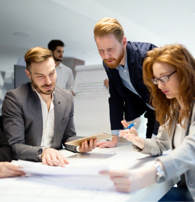 business-people-working-together-on-project-and-B3MZ4TX-min