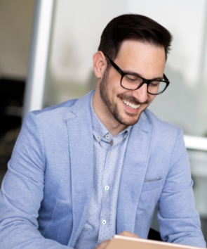 portrait-of-young-businessman-successful-Y3L9NJH